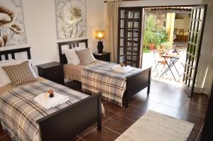 Ένα ή περισσότερα κρεβάτια σε δωμάτιο στο Casa Grande Holidays +15 φωτογραφίες