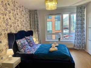 Posteľ alebo postele v izbe v ubytovaní Apartament Long Island Gdańsk