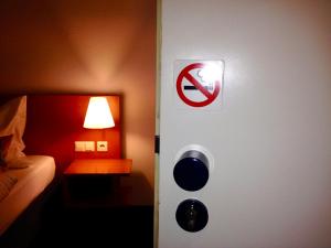Giường trong phòng chung tại Hotel Möhringer Hof