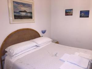 Postel nebo postele na pokoji v ubytování Hotel Vittoria