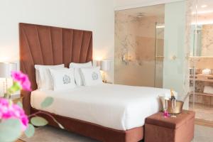 Cama ou camas em um quarto em Hotel República Boutique Hotel