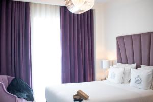 Cama ou camas em um quarto em Hotel República Boutique Hotel