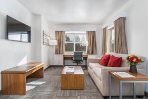 TV a/nebo společenská místnost v ubytování Marshall Suites