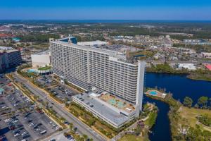 an aerial view of a large hotel building at White Sandy Beaches, Sunsets & Seashells at Laketown Wharf #402 by Nautical Properties in Panama City Beach