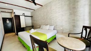 Postel nebo postele na pokoji v ubytování Hotel MAYARI Holbox + 37 fotografií