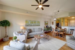 een woonkamer met witte meubels en een plafondventilator bij North Carolina Mountain Home with Beautiful Views! in Burnsville