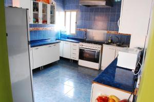Η κουζίνα ή μικρή κουζίνα στο Hostal Pablito