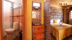 Un baño de Hotel y Cabañas Alan 91 fotos más