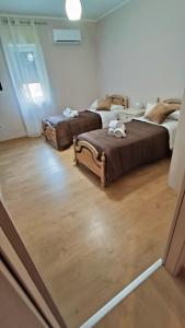Postel nebo postele na pokoji v ubytování La Terrazza Di Athena sweet rooms