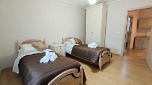 Postel nebo postele na pokoji v ubytování La Terrazza Di Athena sweet rooms