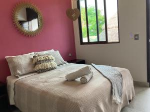 Uma cama ou camas num quarto em Hotel Diosa del Agua Bacalar