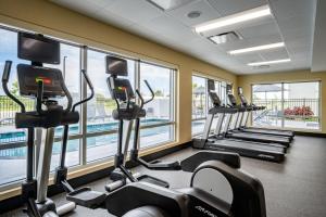 a row of treadmills in a gym with windows at TownePlace Suites By Marriott Venice in Venice