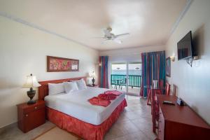 Кровать или кровати в номере Rostrevor Hotel