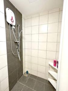 a bathroom with a shower with a shower head at TheSun #BayanLepas#QueensbayMall#PISA#USM in Bayan Lepas