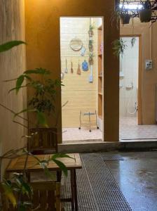 a view of a bathroom with a shower in a room at T30 Hanoi Homestay, near Lotte Tay Ho, 25minutes to the airport in Hanoi