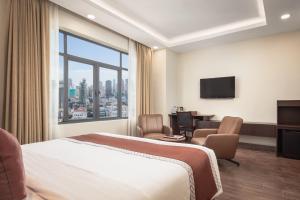 TV a/nebo společenská místnost v ubytování HM Grand Central Hotel