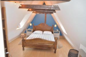 Кровать или кровати в номере L'APPARTEMENT