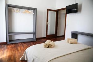 Postel nebo postele na pokoji v ubytování Aura Home rent of rooms with shared kitchen