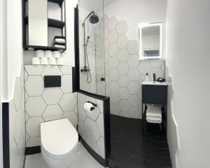 Koupelna v ubytování 2D Apartment