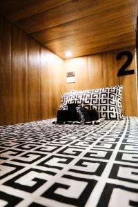Postel nebo postele na pokoji v ubytování J & J Homestay