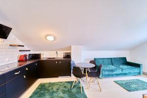 Kuchyňa alebo kuchynka v ubytovaní LAGUNA Apartament Polanica Residence 59 z klimatyzacją
