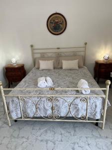 Postel nebo postele na pokoji v ubytování Palazzo Giannotte Suite & Spa