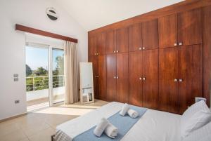 Postel nebo postele na pokoji v ubytování Summer Dream Villa