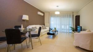 A seating area at Lovely New Βuild Flat Near Metro - Free Parking