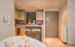 A kitchen or kitchenette at Lovely New Βuild Flat Near Metro - Free Parking
