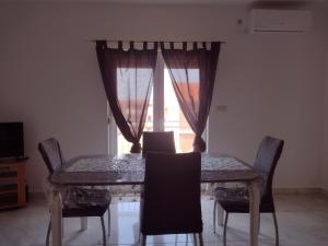 Posedenie v ubytovaní APARTMANI IVA