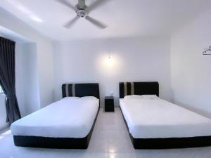 Venice Guest Hostel - Bilik Sahaja客房内的一张或多张床位