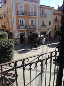 a group of people sitting on bikes in front of buildings at Casa in Piazza in Fondi +3 photos