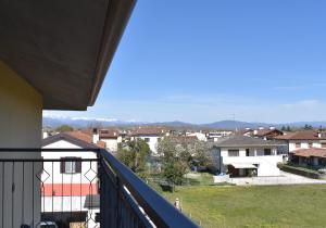a view of a city from a balcony at Meridiana 2 in Pradamano