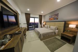 Кровать или кровати в номере Mc Palace Hotel Spa & Convention