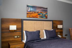 Кровать или кровати в номере Mc Palace Hotel Spa & Convention