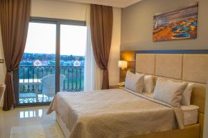 Кровать или кровати в номере Mc Palace Hotel Spa & Convention