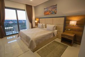Кровать или кровати в номере Mc Palace Hotel Spa & Convention
