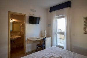 Posteľ alebo postele v izbe v ubytovaní Masseria Torre Del Diamante + 37 fotografií