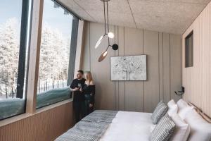 Ένα ή περισσότερα κρεβάτια σε δωμάτιο στο Nova Skyland Hotel