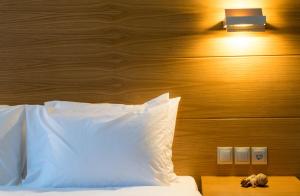 A bed or beds in a room at Villa Vasilis