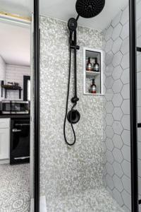 a shower in a kitchen with a shower at Luxurious and Cozy Cabin in a Rural setting - 8 