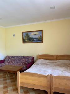 Postel nebo postele na pokoji v ubytování Dili-Jan