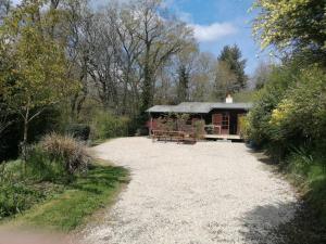 Vonkajšia záhrada v ubytovaní Chalet en pleine nature au bord d'un étang