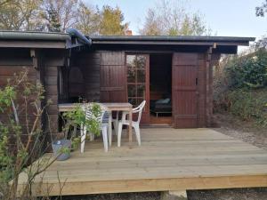 Vonkajšia záhrada v ubytovaní Chalet en pleine nature au bord d'un étang