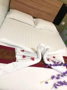 Letto o letti in una camera di Amigo Hotel