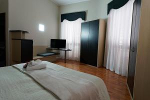 TV a/nebo společenská místnost v ubytování Hotel Sant'Elia