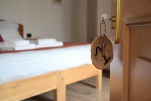 Postel nebo postele na pokoji v ubytování La Tana del Tasso Rooms&Breakfast