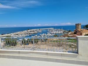 a view of a marina with boats in the water at Casa Michela, sea-view apartments in Trabia