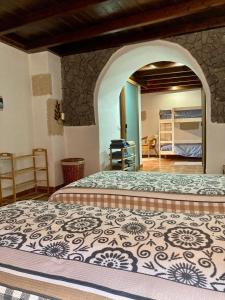 Postel nebo postele na pokoji v ubytování Casa Cueva - L&L
