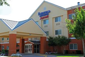 a rendering of the front of a hotel at Fairfield Inn & Suites Dallas Park Central in Dallas